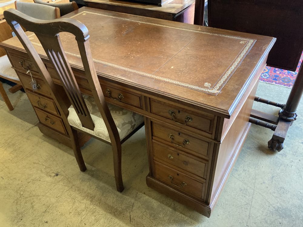 A late Victorian mahogany pedestal desk, width 138cm, depth 71cm, height 74cm together with an Art Nouveau inlaid chair